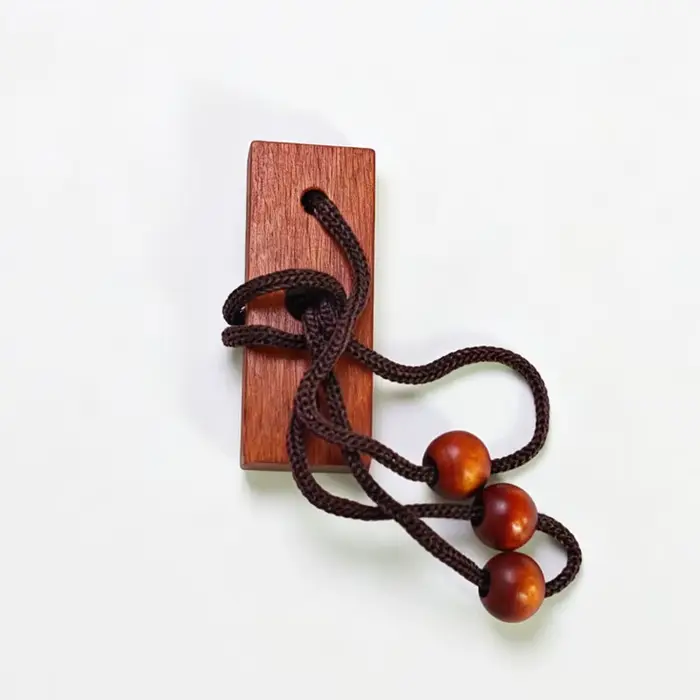 Puzzle de corde en bois pour enfiler les boucles, défi mental éducatif pour enfants et adultes