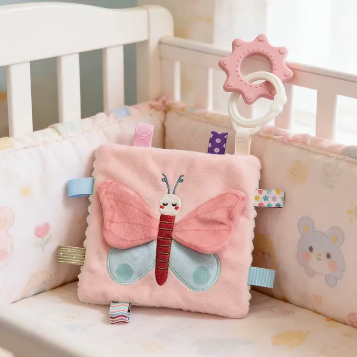 Couverture sensorielle pour bébé avec hochet