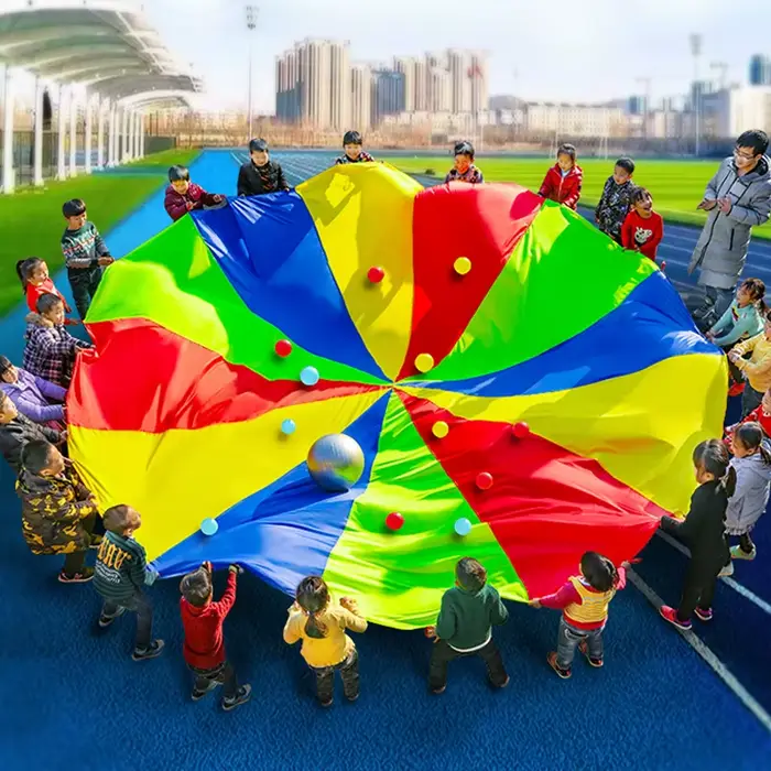 Parachute arc-en-ciel pour enfants, jeux de plein air, jouet pour enfants, 2m, 3m, 5m, travail d'équipe coopératif, fête, carnaval, faveurs amusantes